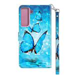 Cover Samsung Galaxy S21 FE Papillons Bleus Flounces