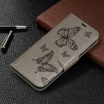 Custodia per Huawei P30 con farfalle e linguetta obliqua