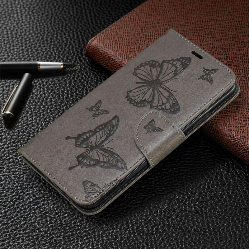 Custodia con cordino per iPhone 11 Max con farfalle stampate